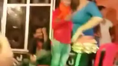 Two slim Desi teens seductively dance during XXX show under the tent