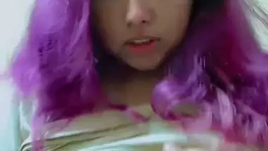 Purple head desi girl holding huge milk tankers