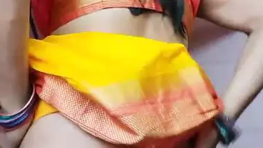 Indian shemale enjoys strip teasing and masturbating