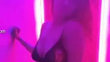 Enticing young woman reveals private parts posing in XXX lingerie